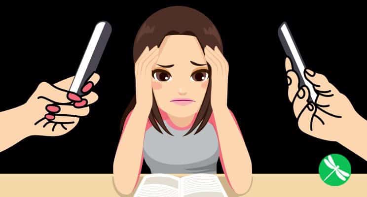 Stressful child with phone distractions at childcare center. An anxious girl holding her head while two hands with phones distract her at a childcare center.